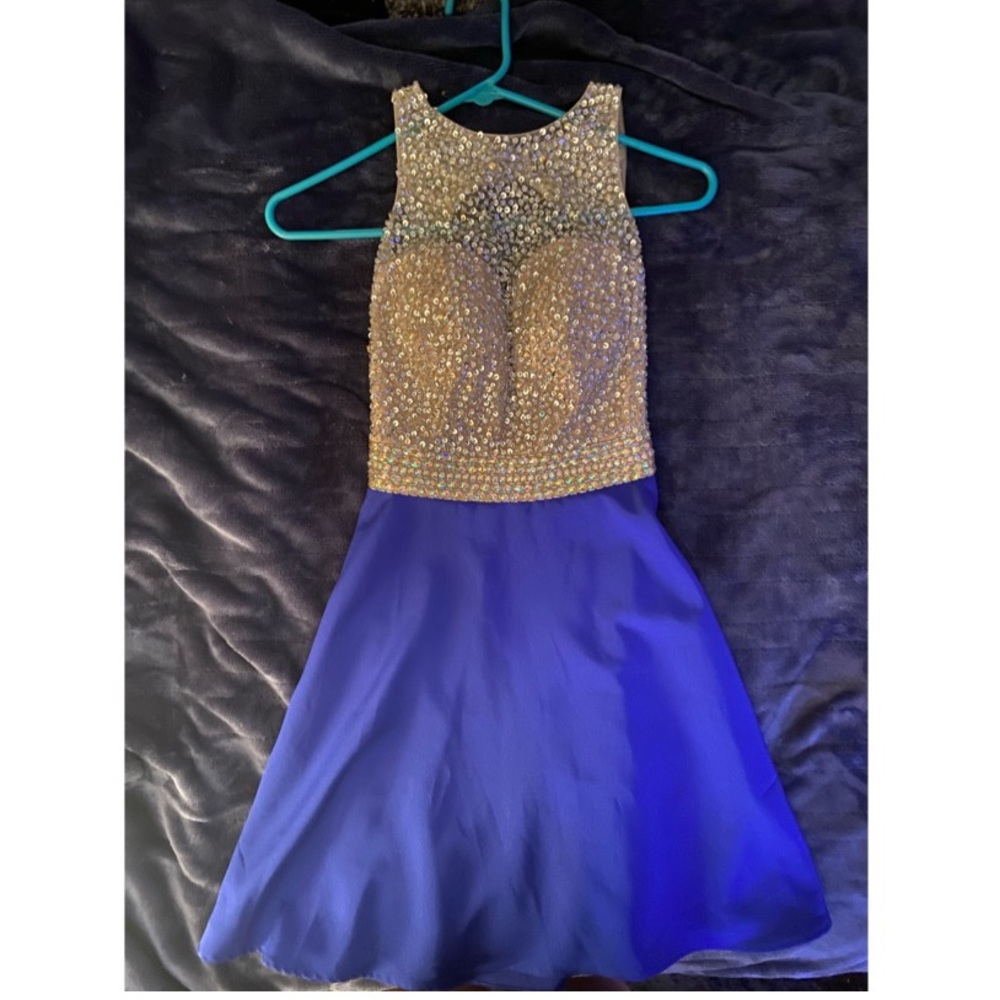 Sparkly silver top, navy bottom, size 6. Wore once